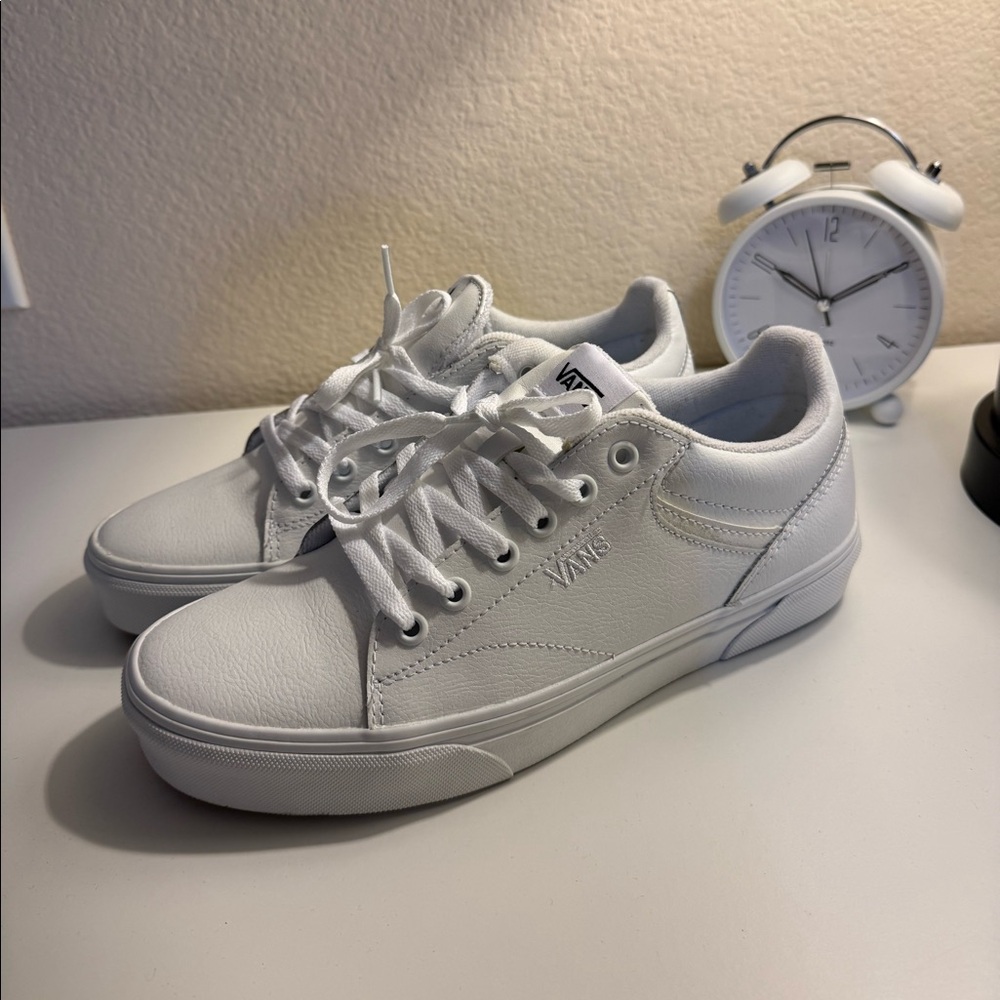White Vans Old Skool trainers 
White Vans “Off the wall”